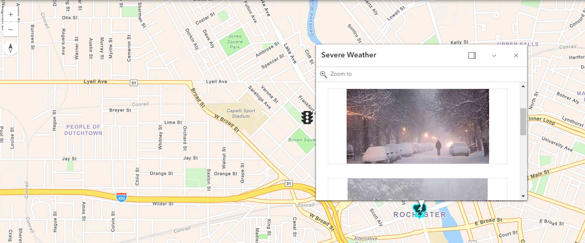 a street map of an area of the City of Rochester, with a pin dropped and an image popup labeled Severe Weather showing a photo of a snowy tree lined with snow-covered cars.