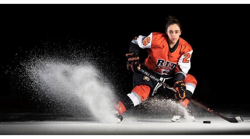 Baylee Trani playing ice hockey