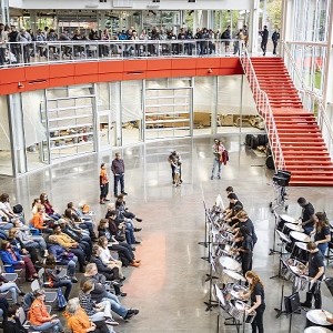 People watching Orchestra in the shed