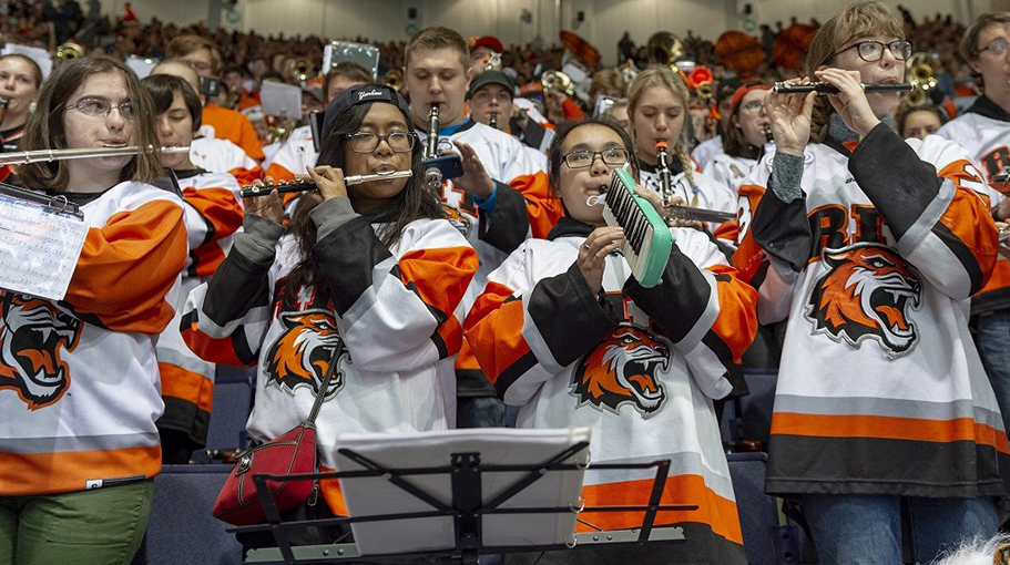 Students playing musical instruments