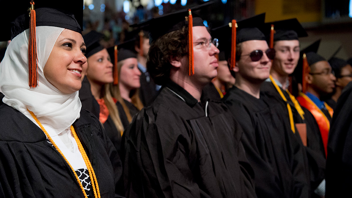 Students posing for graduation