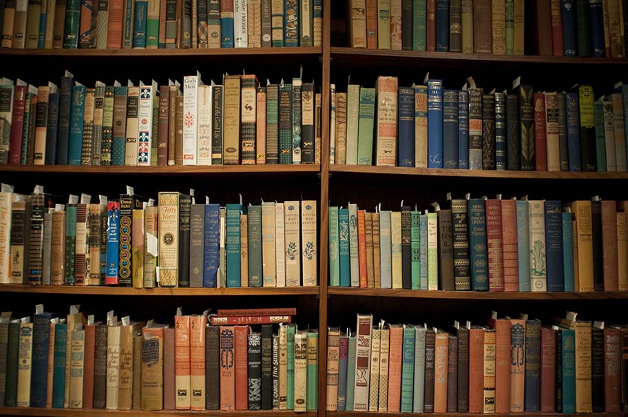 Bookshelf filled with vintage books