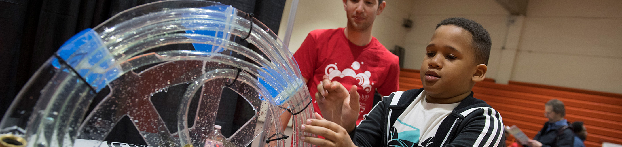 A child using a clear instrument at Imagine RIT.