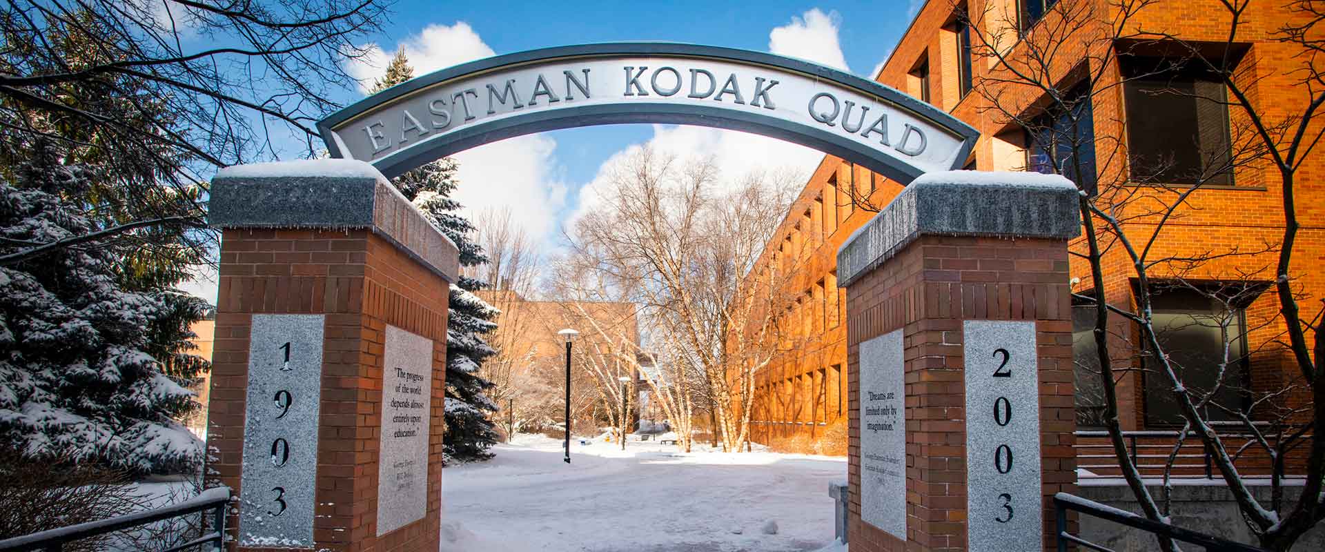 archway to the Eastman Kodak Quad on a sunny winter day.