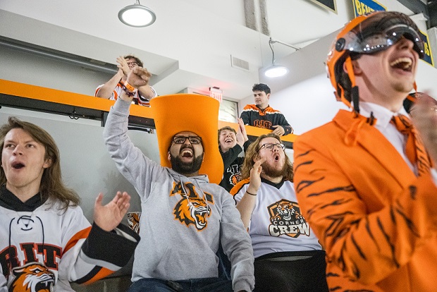 People cheering for RIT