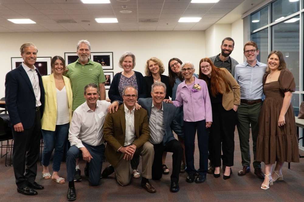 ann nealon and family posing for group photo