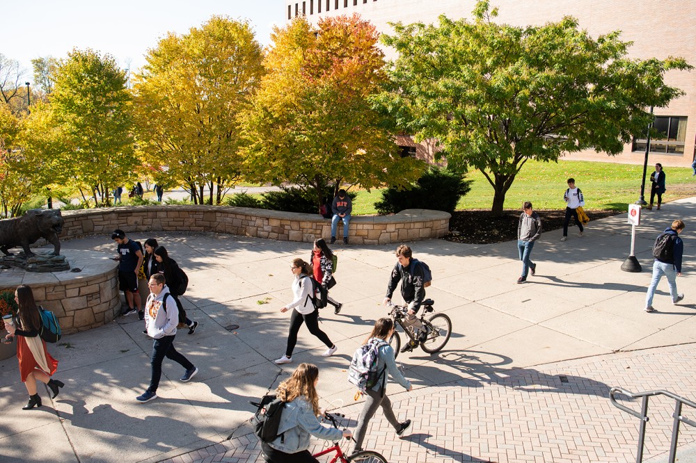 RIT students walking on campus