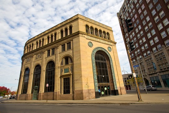 Outside view of old bank in downtown Rochester.