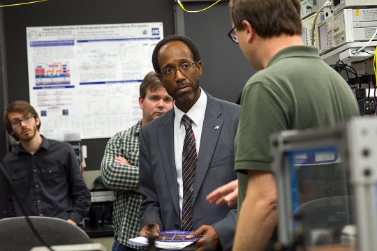 Men tour Center for Detectors.