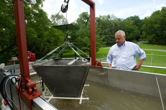 Person looking at mechanism