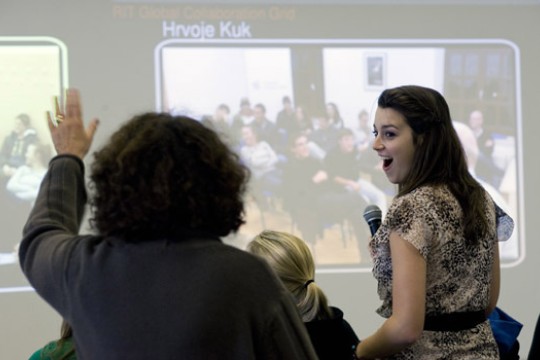 People speaking at event
