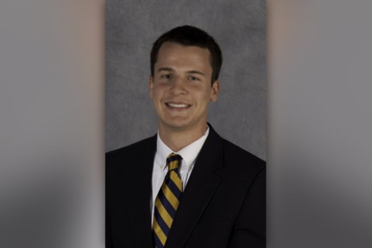 Professor posing for camera