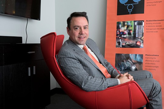Person posing for camera in chair