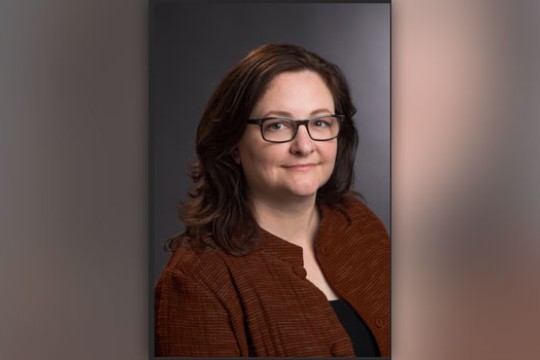 Headshot of Robin Cass.