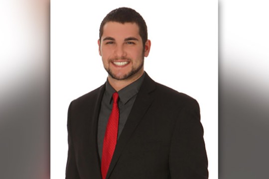 Business man posing for camera