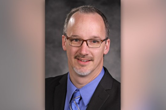 Professor posing for camera