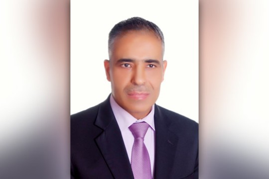 Professor posing for camera