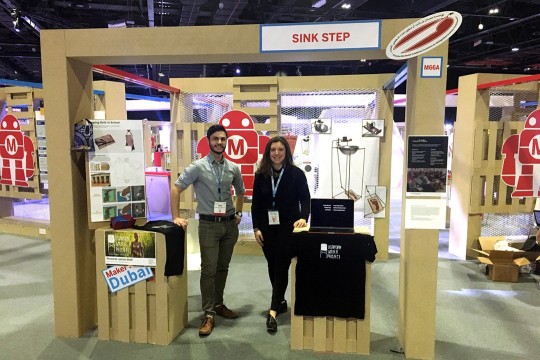 Frank Barletta and Hannah Giancola post up at their booth at Dubai's Maker Faire.