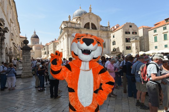 a tiger mascot in the streets of Croatia.