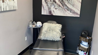 Massage table with a fluffy pillow