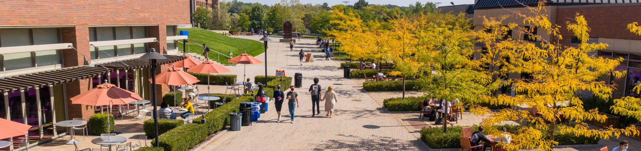 an aerial photo of the RIT campus with students walking on the quad