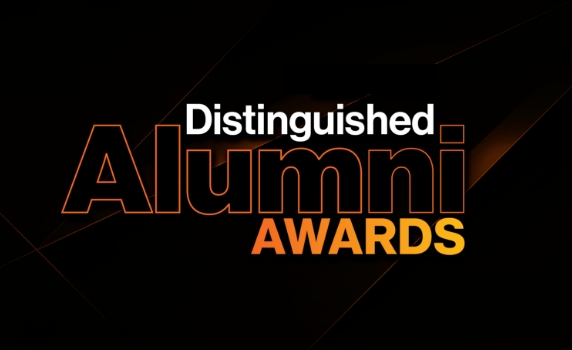 a poster saying Distinguished Alumni Awards