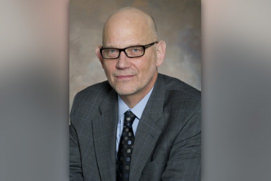 Professor posing for camera