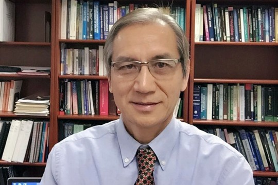 portrait of Yong “Tai” Wang.