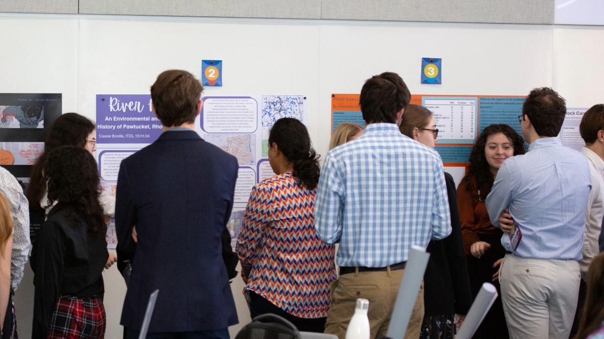 Students presenting their posters at the 2024 Fall Honors Research Symposium