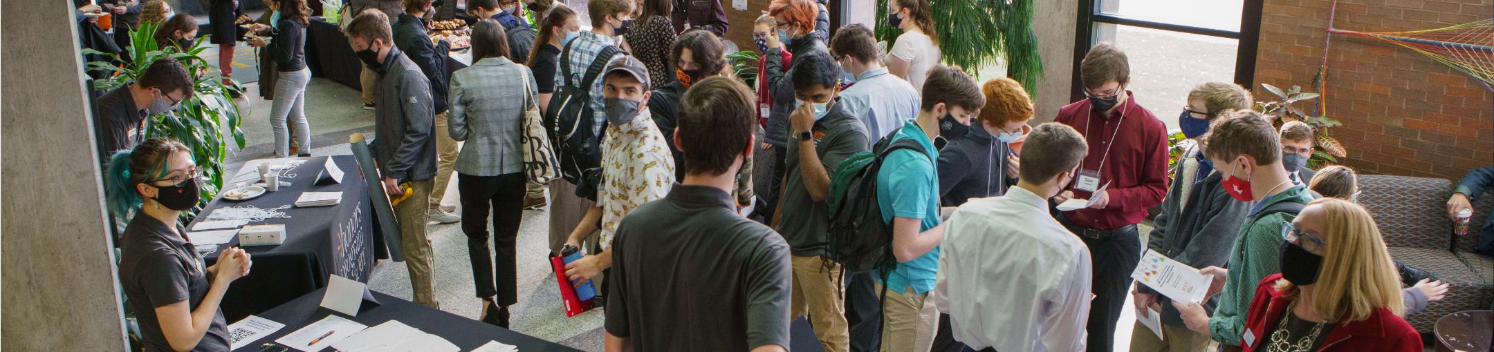 A large group of students at an orientation gathering