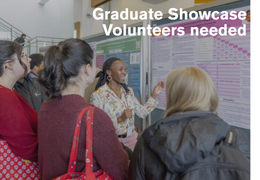 Students (left) are gathered around a student presenter(right). The student presenter is demonstrating to the poster on her left