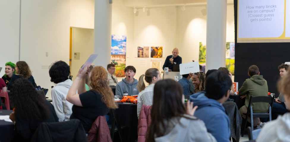 Image of RIT Honors Internal Admit students being presented to by Assistant Director of the Program Garth Freeman