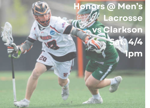 Two men on the lacrosse field battling it out for the ball!