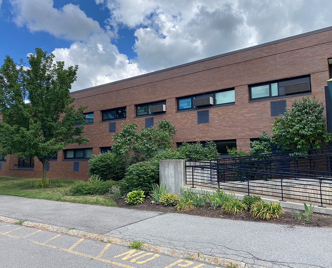 entrance of brick residence hall d