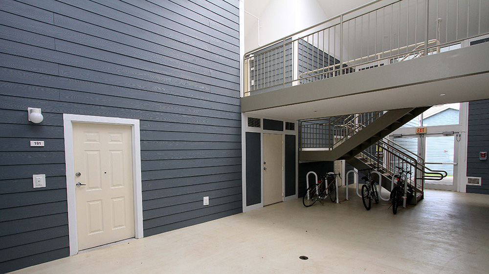 University Commons hallway with stairs and bike storage area