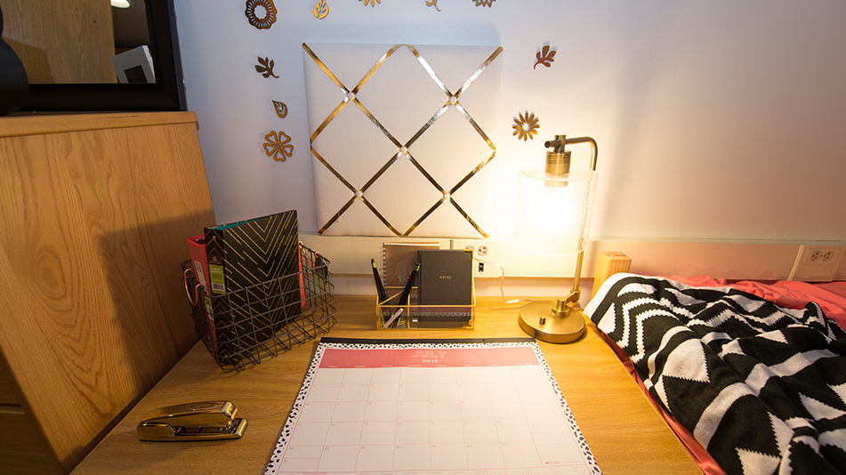 view of a desk with a writing pad