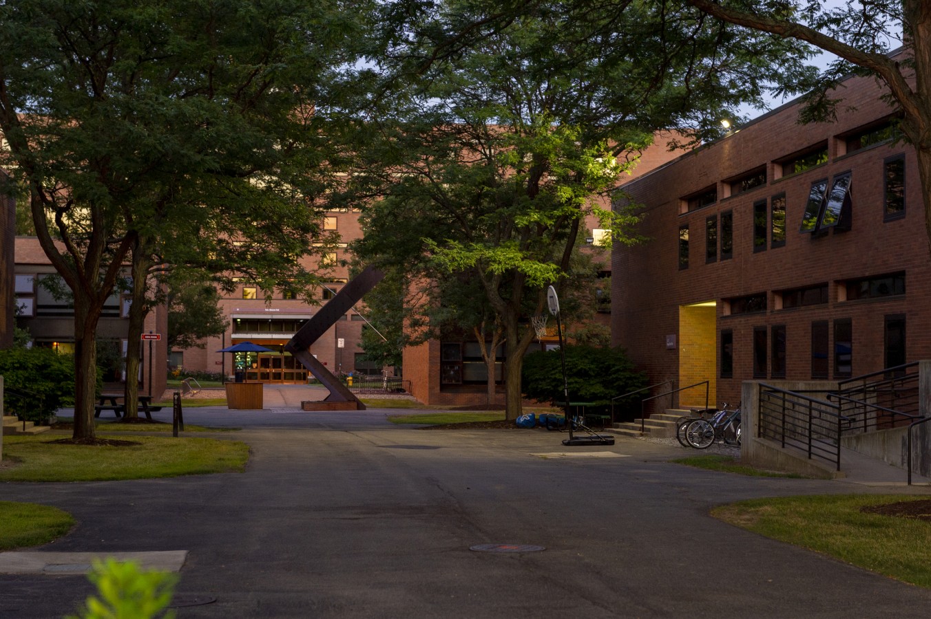 photo of the dorms outside with trees overtop