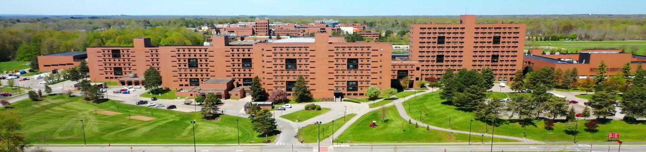 aerial view of brick residence hall buildings