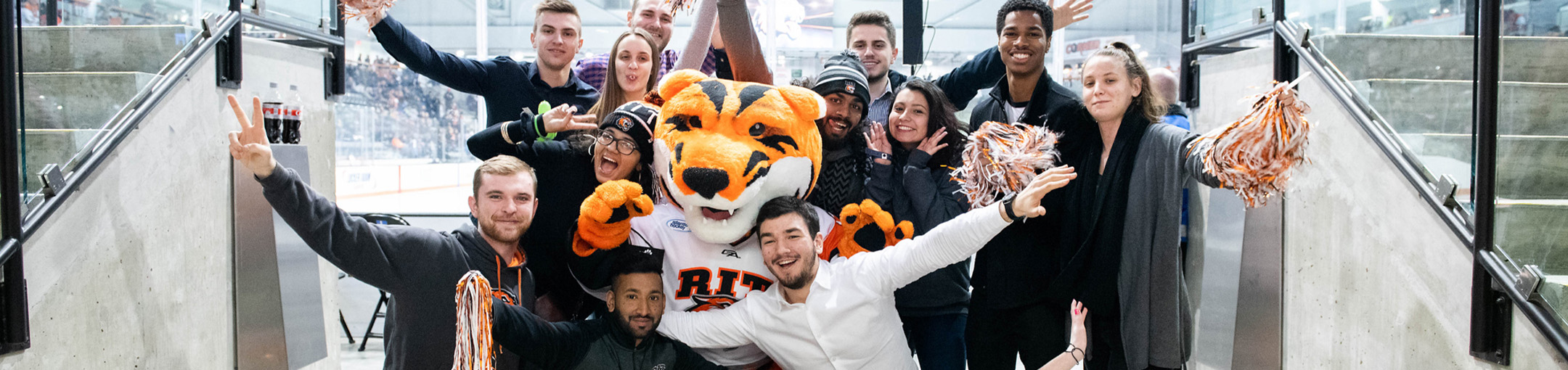 students posing with ritchie in front of ice at GPC