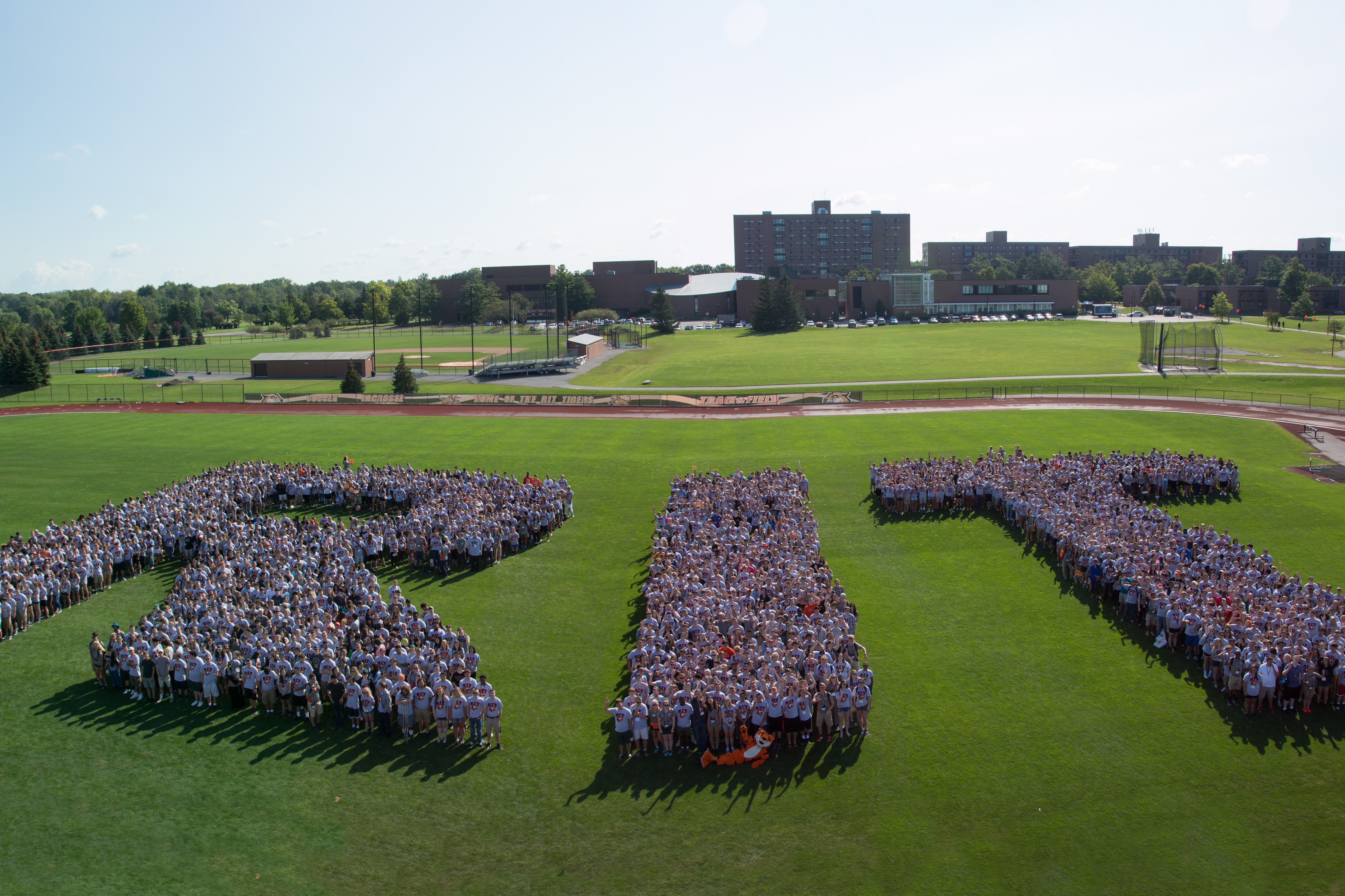 New RIT students grouped in 3 different areas to form the letters of RIT