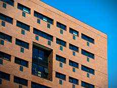 high rise brick building, front of Ellingson Hall