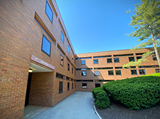 low rise brick building, front of Fish Hall