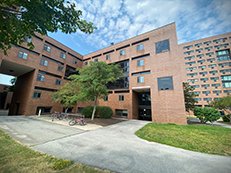 low rise brick building, front of Gibson Hall