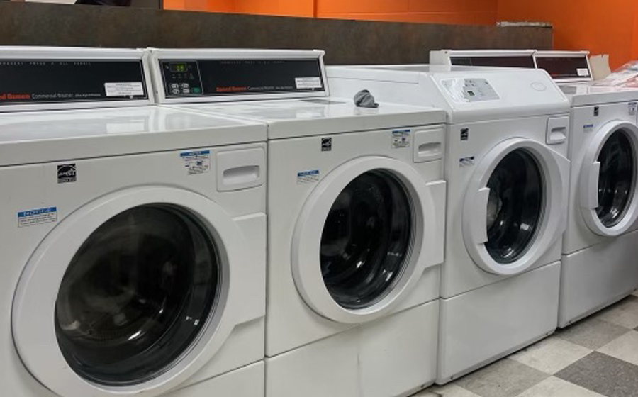 laundry machines in a line