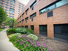 low rise brick building, side of Peterson Hall
