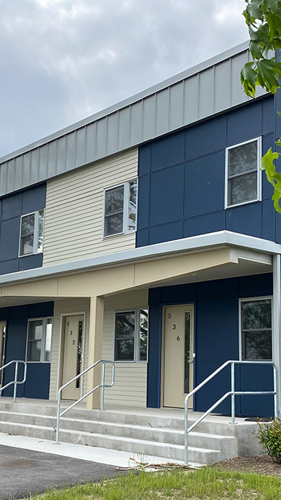 blue and cream two floor apartment building