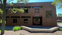 entrance of brick residence hall, Frances Baker Hall