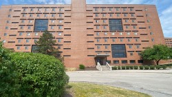 entrance of high rise brick residence hall, Sol Heumann Hall