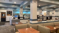 restaurant with a variety of tables, chairs, and booths