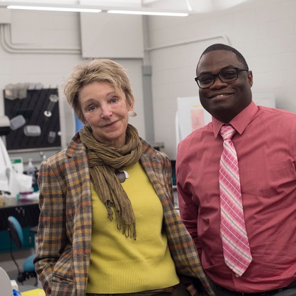 two people standing in lab.